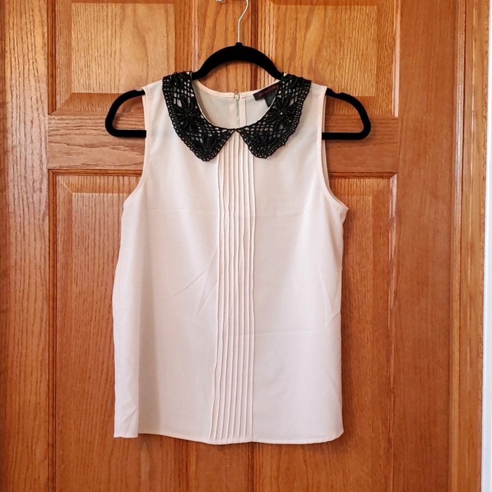 Peter pan collared shell